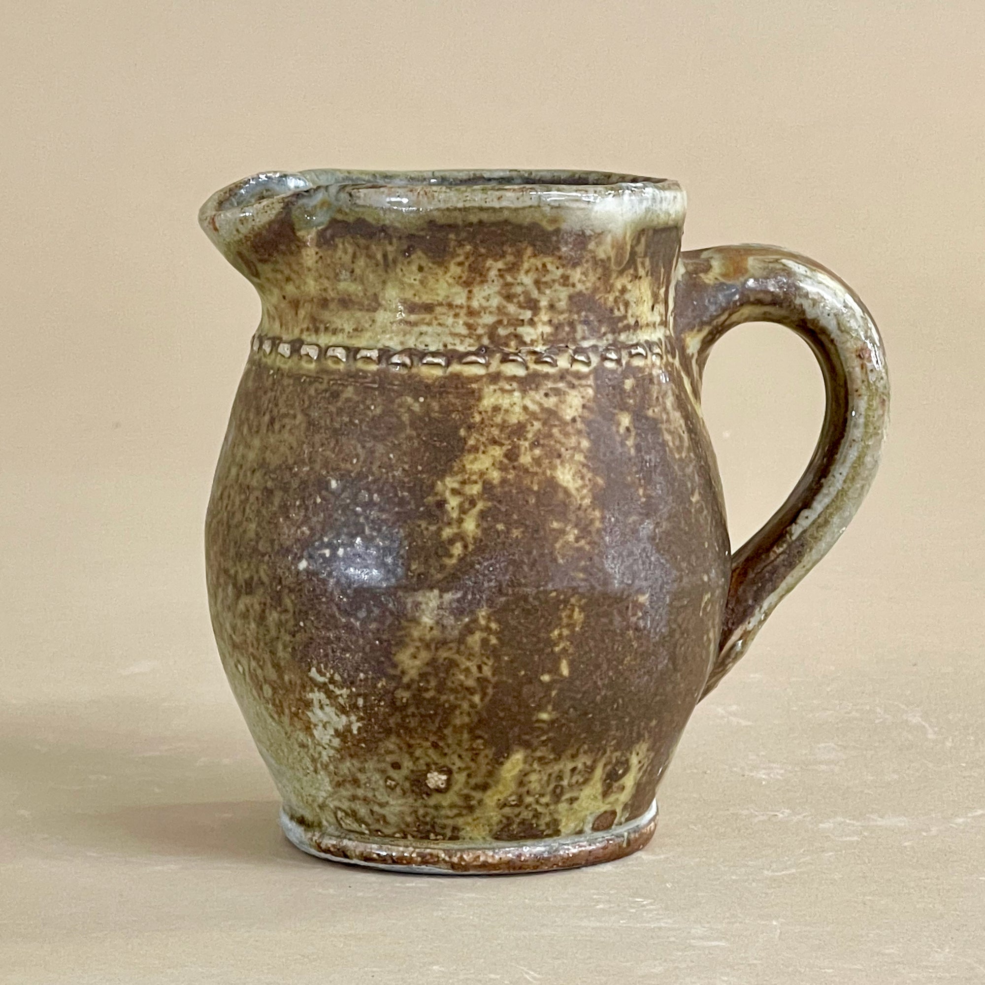 One of a Kind Cream Pitchers